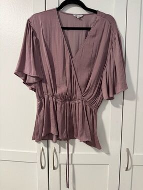 Naked Zebra mauve wrap peplum blouse with flutter sleeves